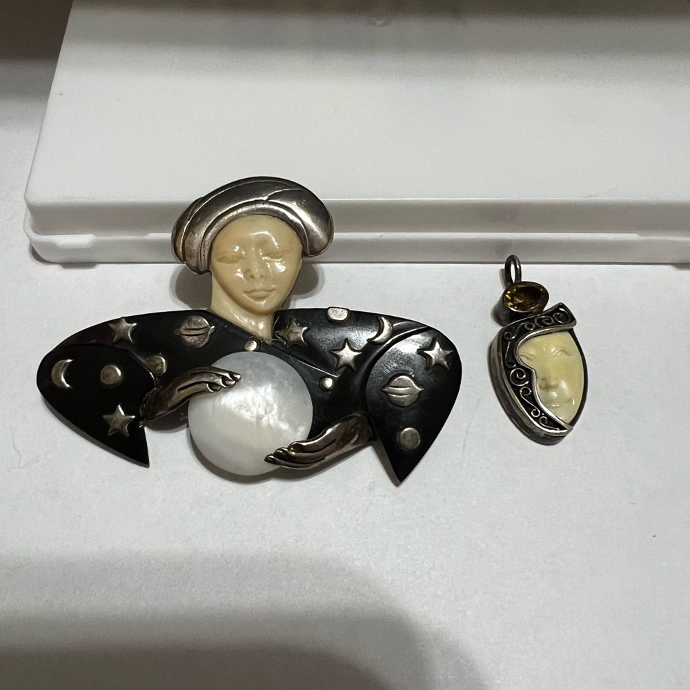 Zealandia Fortune Teller Brooch & Enigma Face Pendant